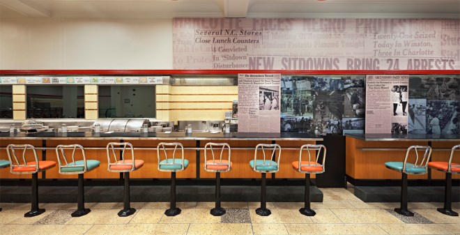 The lunch counter exhibit at the International Civil Rights Center & Museum in Greensboro, NC. Photo via ArchDaily.